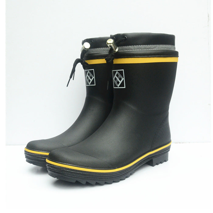 Black toggle wellies with yellow stripe